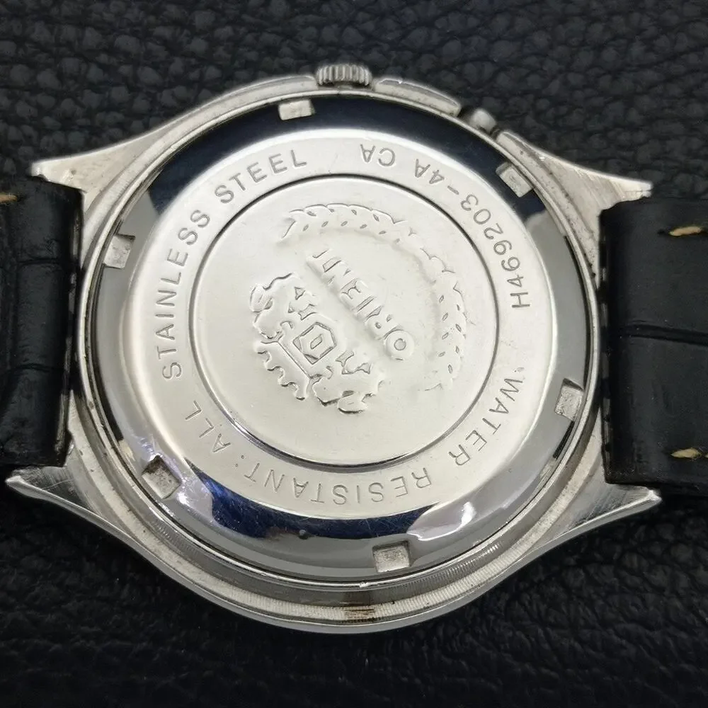 Vintage 1977 Oval Orient Automatic Mens Silver Watch W/daydate & White accents